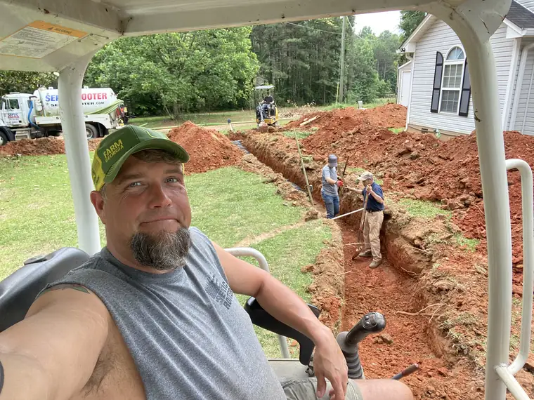 SepticRooter™ technician diagnosing a septic problem in Metro Atlanta, GA