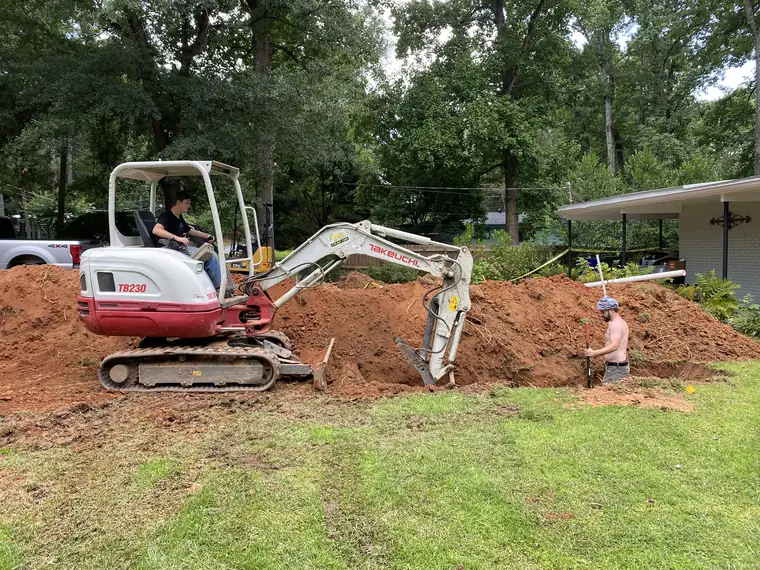 SepticRooter™ excavator installing a septic system in Metro Atlanta, GA