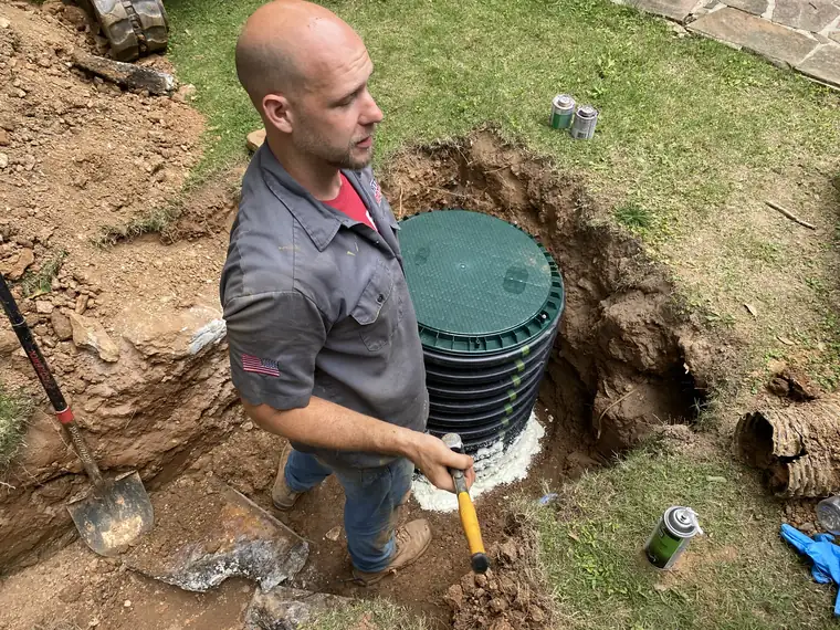 SepticRooter™ technician diagnosing a septic system in Metro Atlanta, GA